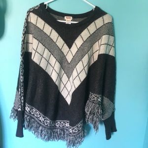 Grey and black poncho